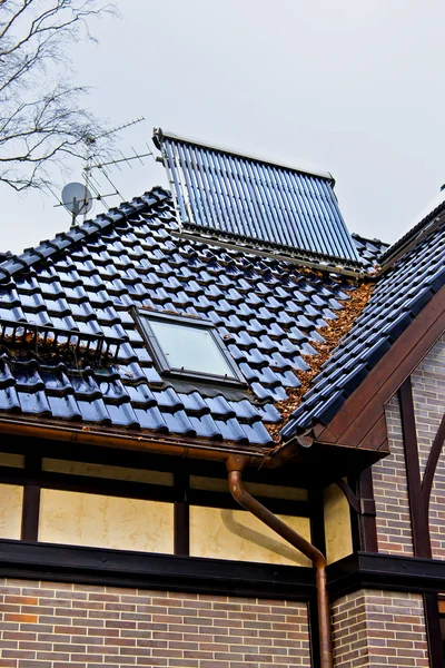 Solar collector on the roof of a house — Stock Photo, Image