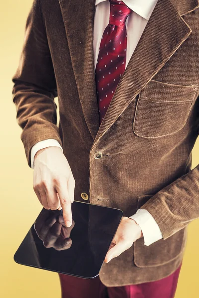 Hipster businessman using tablet — Stock Photo, Image