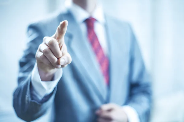 Business man pointing towards camera — Stock Photo, Image