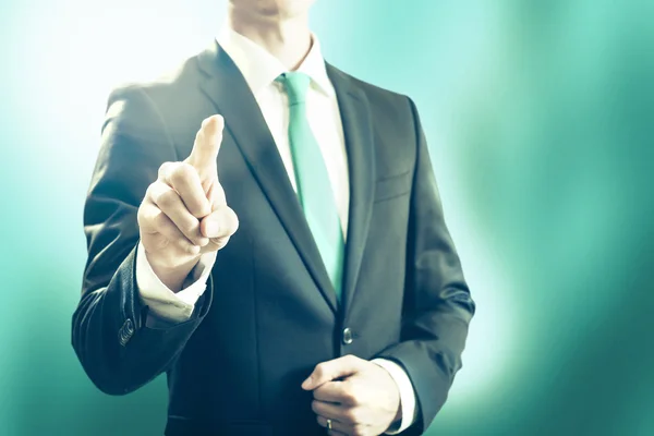 Business man pointing towards camera — Stock Photo, Image