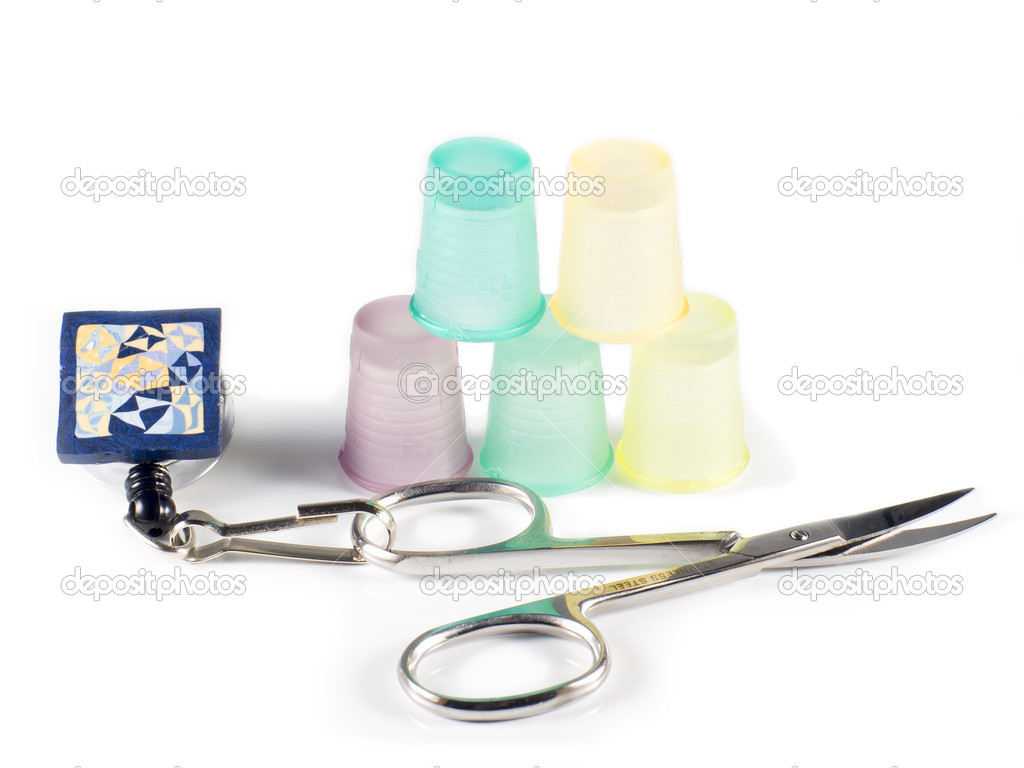 Metal Scissors and Colored Plastic Thimbles