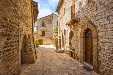 The Medieval religious christian town of Assisi in Umbria, Italy clipart