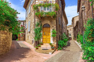 The Medieval religious christian town of Assisi in Umbria, Italy clipart