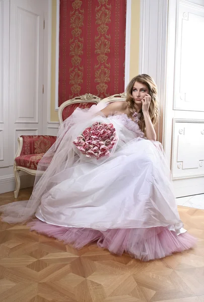 Sad bride sitting in luxurious palace — Stock Photo, Image
