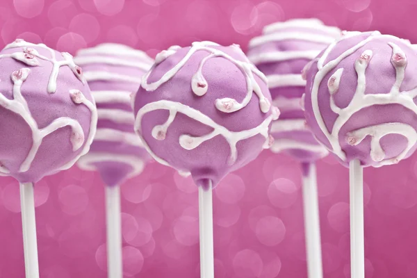 Cake Pops auf rosa Hintergrund — Stockfoto