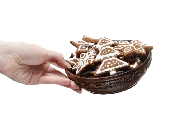 Bowl of gingerbread cookies in beautiful hand isolated on white — Stock Photo, Image