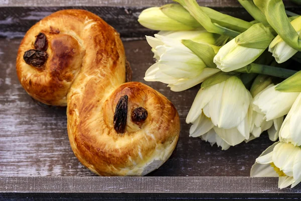 Traditional swedish buns. A saffron bun, in Swedish lussebulle — Stock Photo, Image
