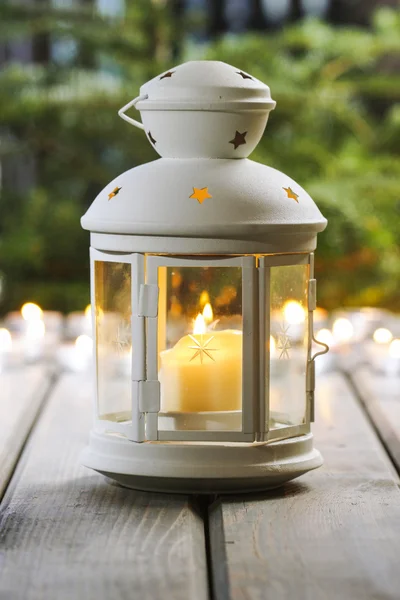 White lantern on wooden rustic table. — Stock Photo, Image