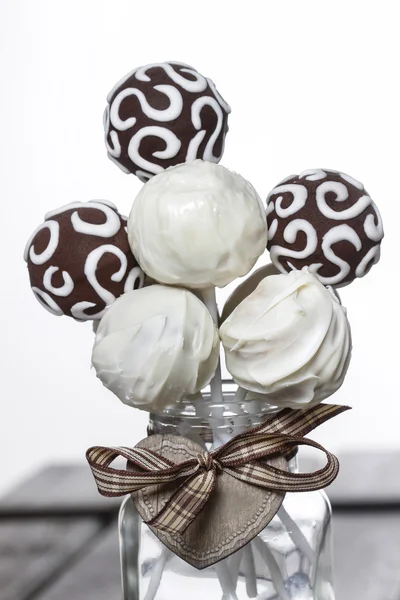 Chocolate cake pops on white background — Stock Photo, Image