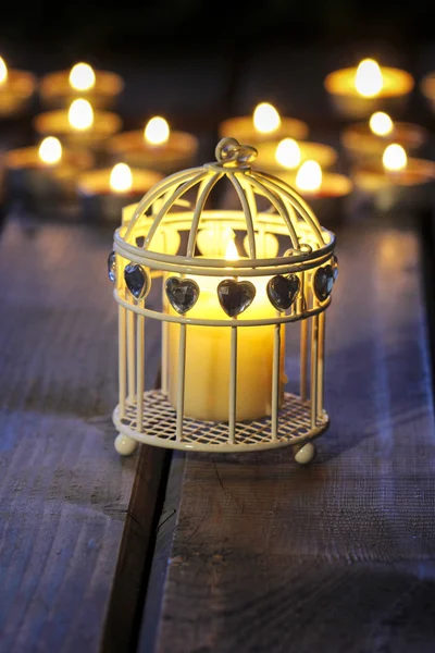 Oriental lantern on wooden table in the evening. Selective focus — Stock Photo, Image