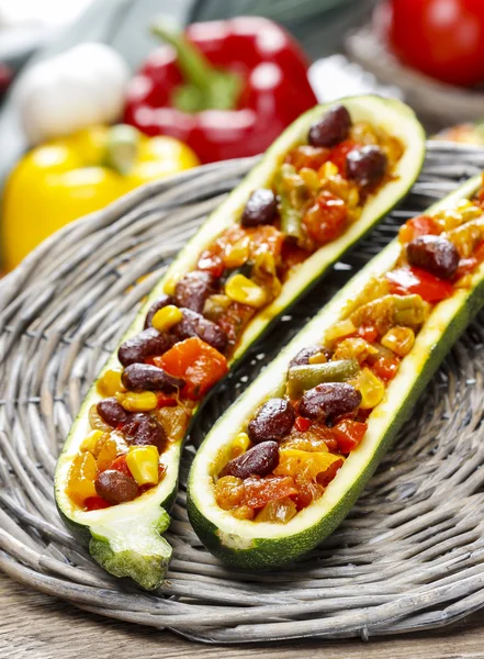 Zucchini stuffed with vegetable salad — Stock Photo, Image