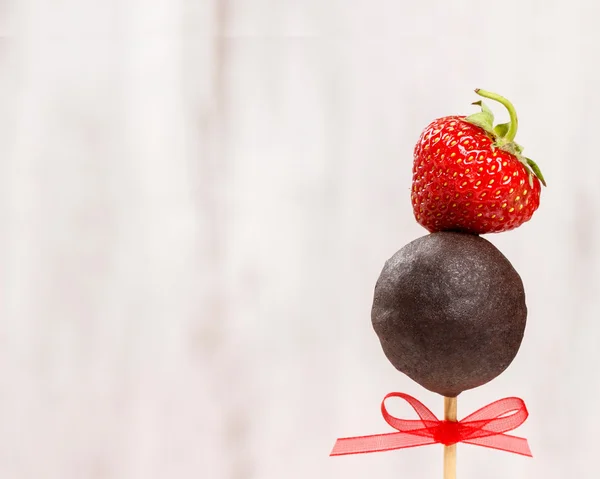 Chocolate cake pops with strawberry — Stock Photo, Image