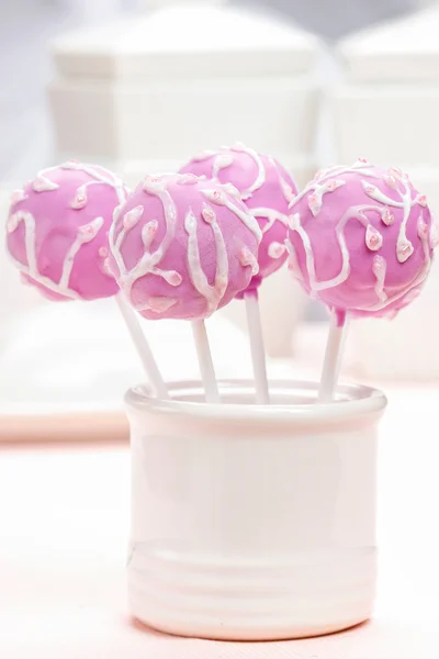 Lilac cake pops decorated lavishly decorated with icing — Stock Photo, Image