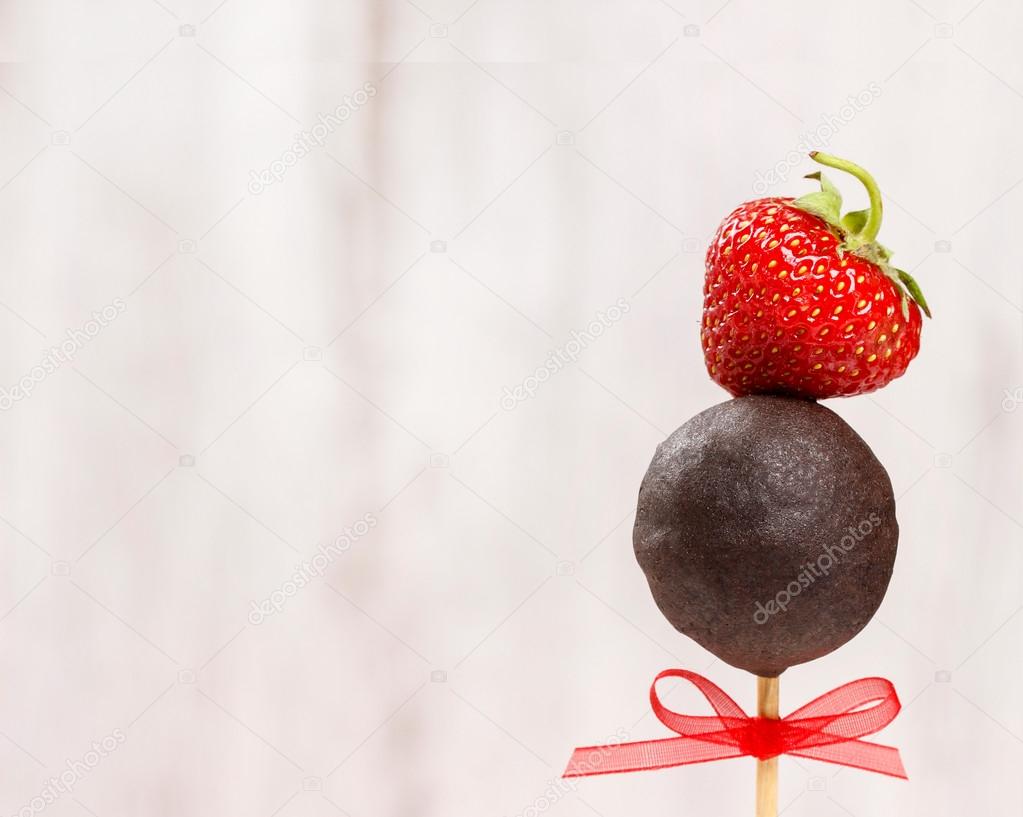 Chocolate cake pops with strawberry