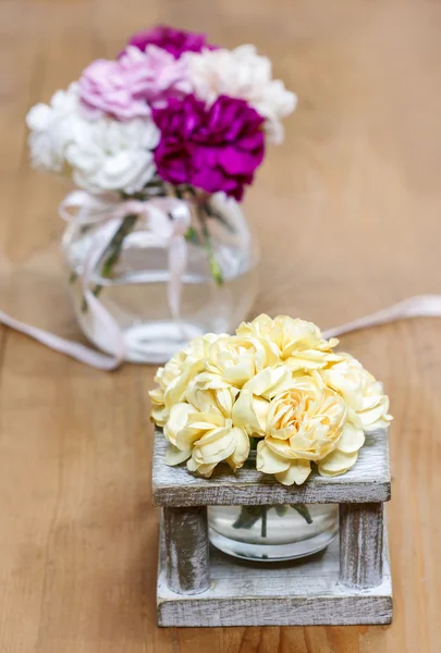 Yellow carnation flowers in vase — Stock Photo, Image