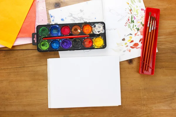 Blank sheet of paper and drawing accessories. — Stock Photo, Image