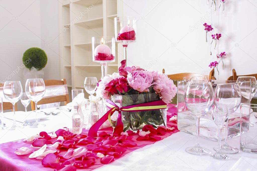 Stunning wedding decoration made of pink and red roses.