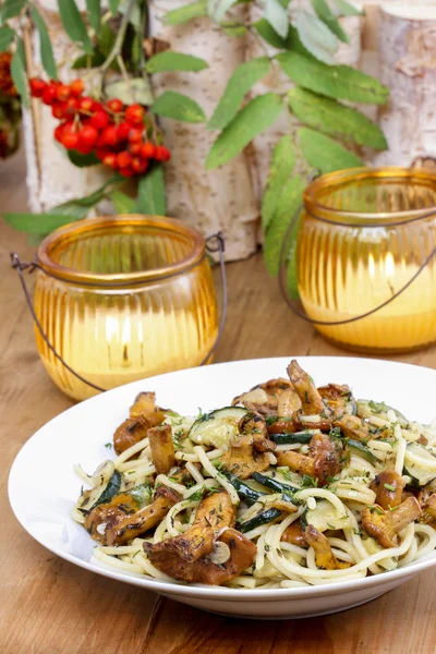 Macaroni with mushrooms on wooden rustic table. Autumn setting — Stock Photo, Image