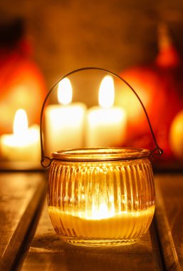 Oriental lantern on wooden table in the evening. Selective focus