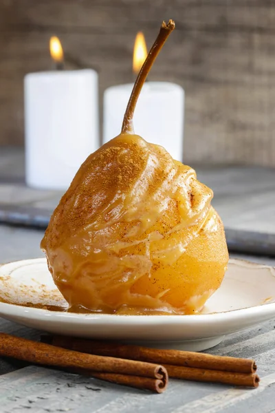 Pear with caramel sauce. French dessert — Stock Photo, Image