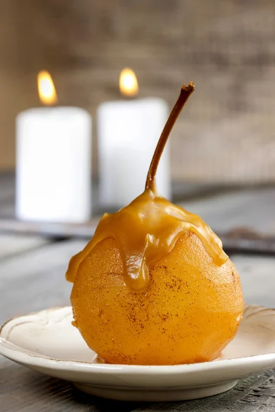 Pear with caramel sauce. French dessert — Stock Photo, Image