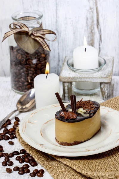 Cappuccino cake on white plate. Selective focus — Stock Photo, Image