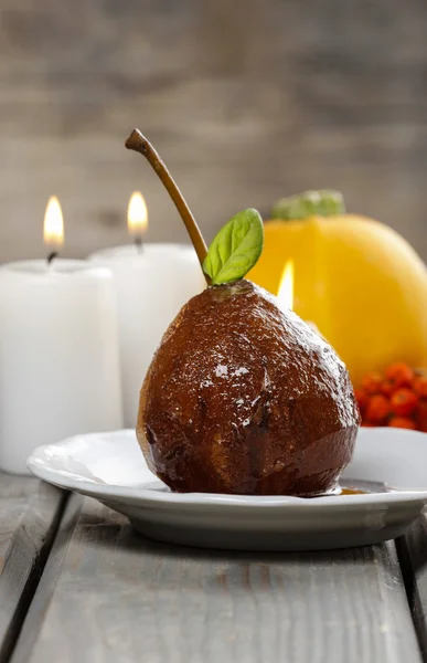 Pear with chocolate sauce. French dessert. Selective focus — Stock Photo, Image