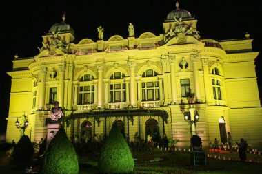 Juliusz Slowacki Theatre in Krakow with special illumination in clipart
