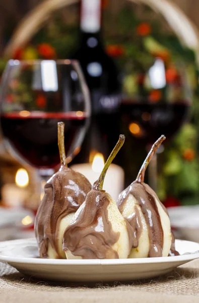 Pear in chocolate — Stock Photo, Image