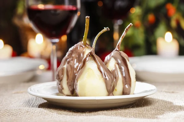 Pear in chocolate — Stock Photo, Image