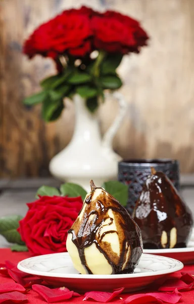 Pear with chocolate — Stock Photo, Image