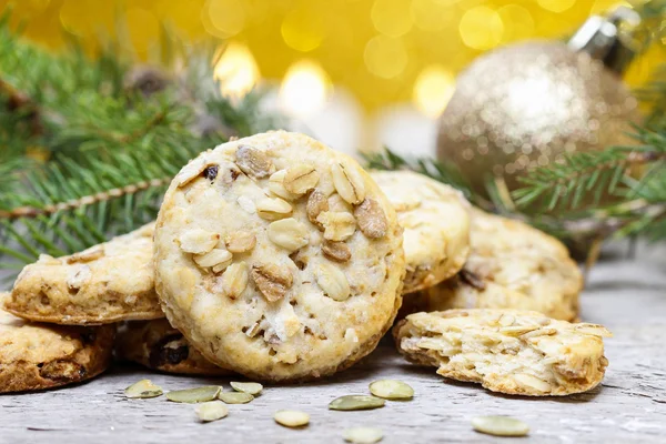 Pumpkin cookies in christmas setting — Stock Photo, Image