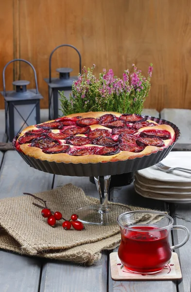 Plum pie on party table — Stock Photo, Image