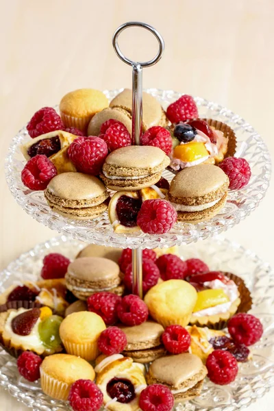 Two level dessert stand full of sweets. Selective focus — Stock Photo, Image