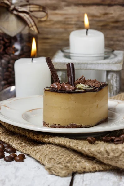 Cappuccino cake on white plate. Selective focus — Stock Photo, Image