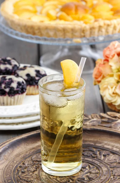 Peach drink on wooden tray — Stock Photo, Image