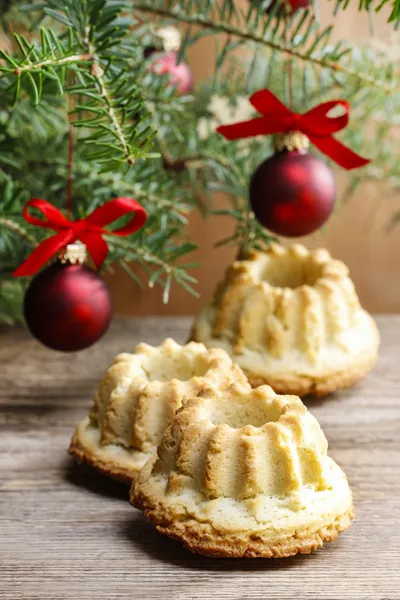 Festive breads under christmas tree. — Stock Photo, Image