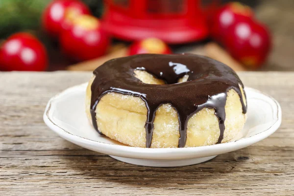 Christmas donut with chocolate on wooden table. Beautiful xmas — Stock Photo, Image