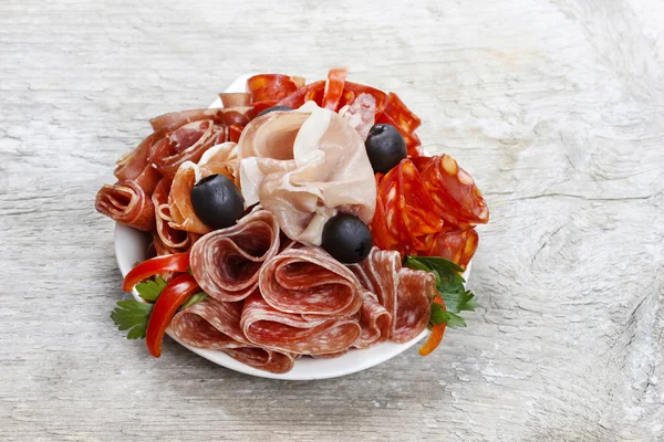 Delicious sliced ham. Party platter of assorted cured meats — Stock Photo, Image