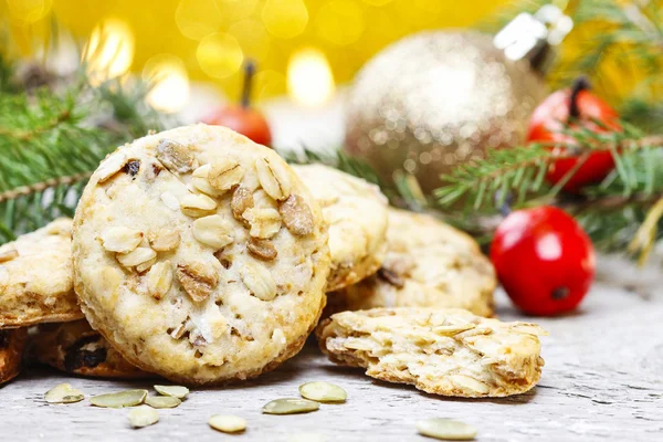 Pumpkin cookies in christmas setting — Stock Photo, Image