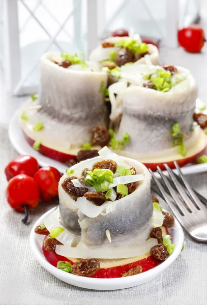 Pickled herring rolls with vegetables — Stock Photo, Image