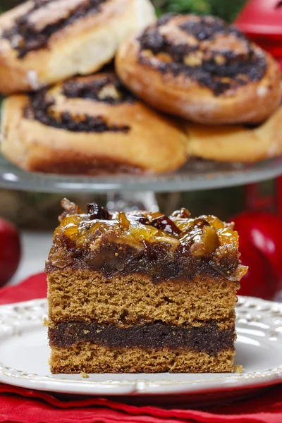 Layer cake decorated with dried fruits and honey — Stock Photo, Image