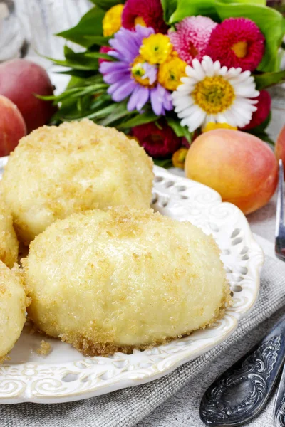 Peach in pastry, popular austrian dish. Garden party table — Stock Photo, Image