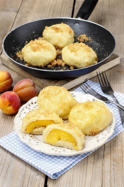 Peach in pastry, popular austrian dish. Garden party table — Stock Photo, Image