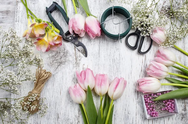 Florist workplace: flowers and accessories — Stock Photo, Image