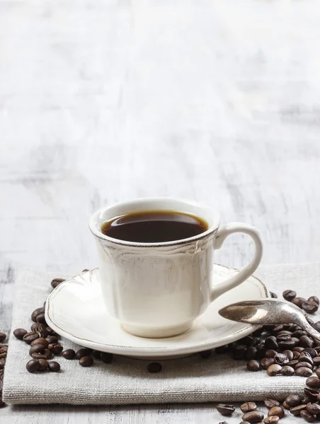 Time to relax: cup of coffee on wooden table — Stock Photo, Image