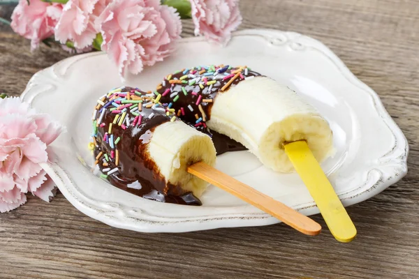 Chocolate dipped bananas — Stock Photo, Image