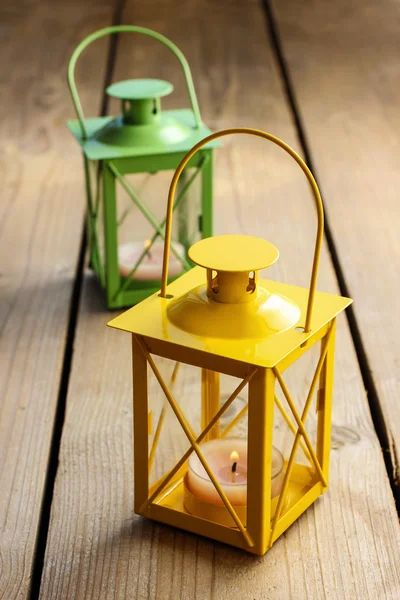 Two iron lanterns: yellow and green — Stock Photo, Image