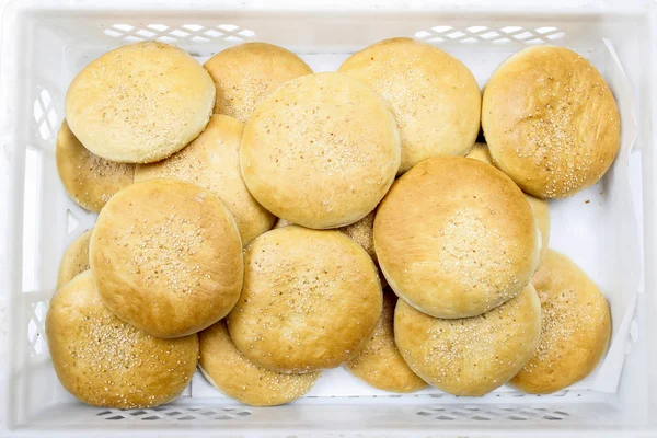 Box of fresh round buns — Stock Photo, Image