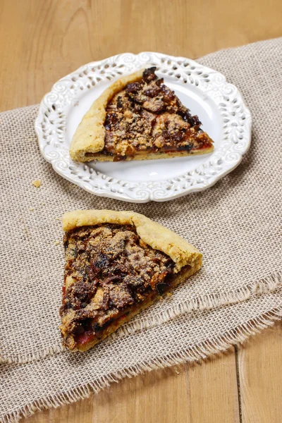 Mushrooms galette on wooden table — Stock Photo, Image